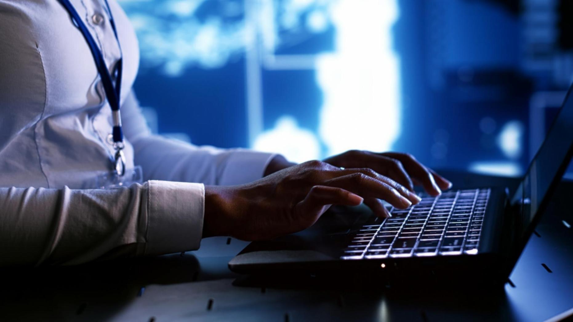 Students collaborating on user experience design projects in our interactive learning space